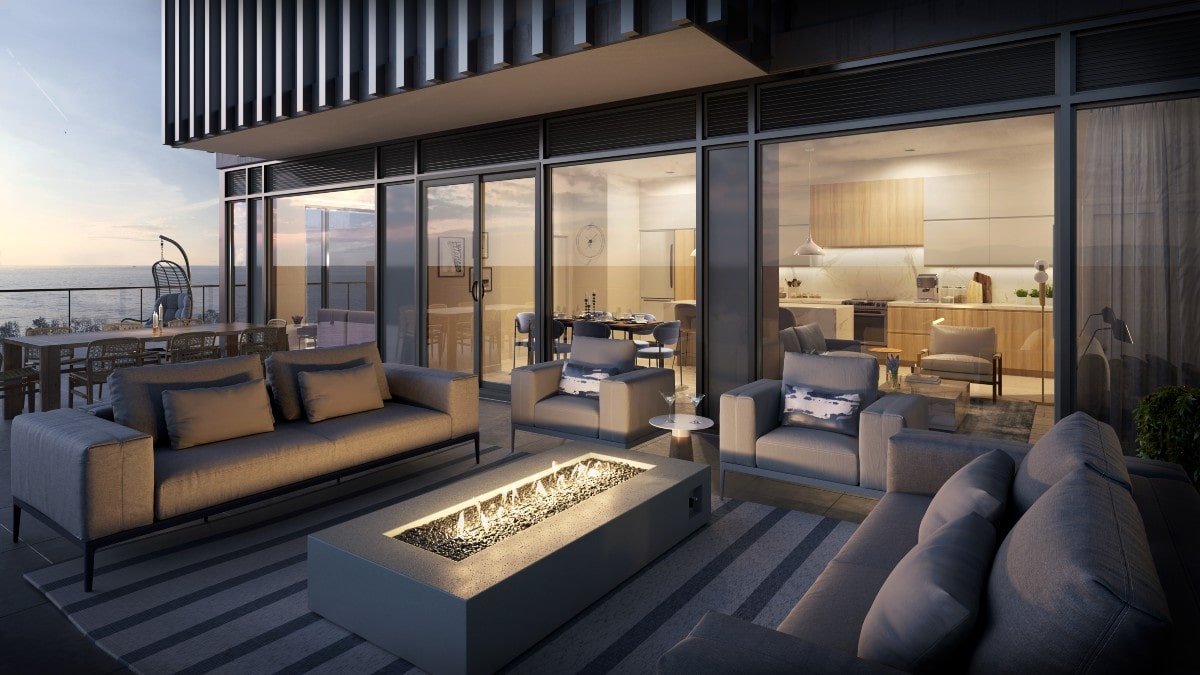 Beautiful outdoor lounge area with fire pit at Rise at Stride Condos in Port Credit