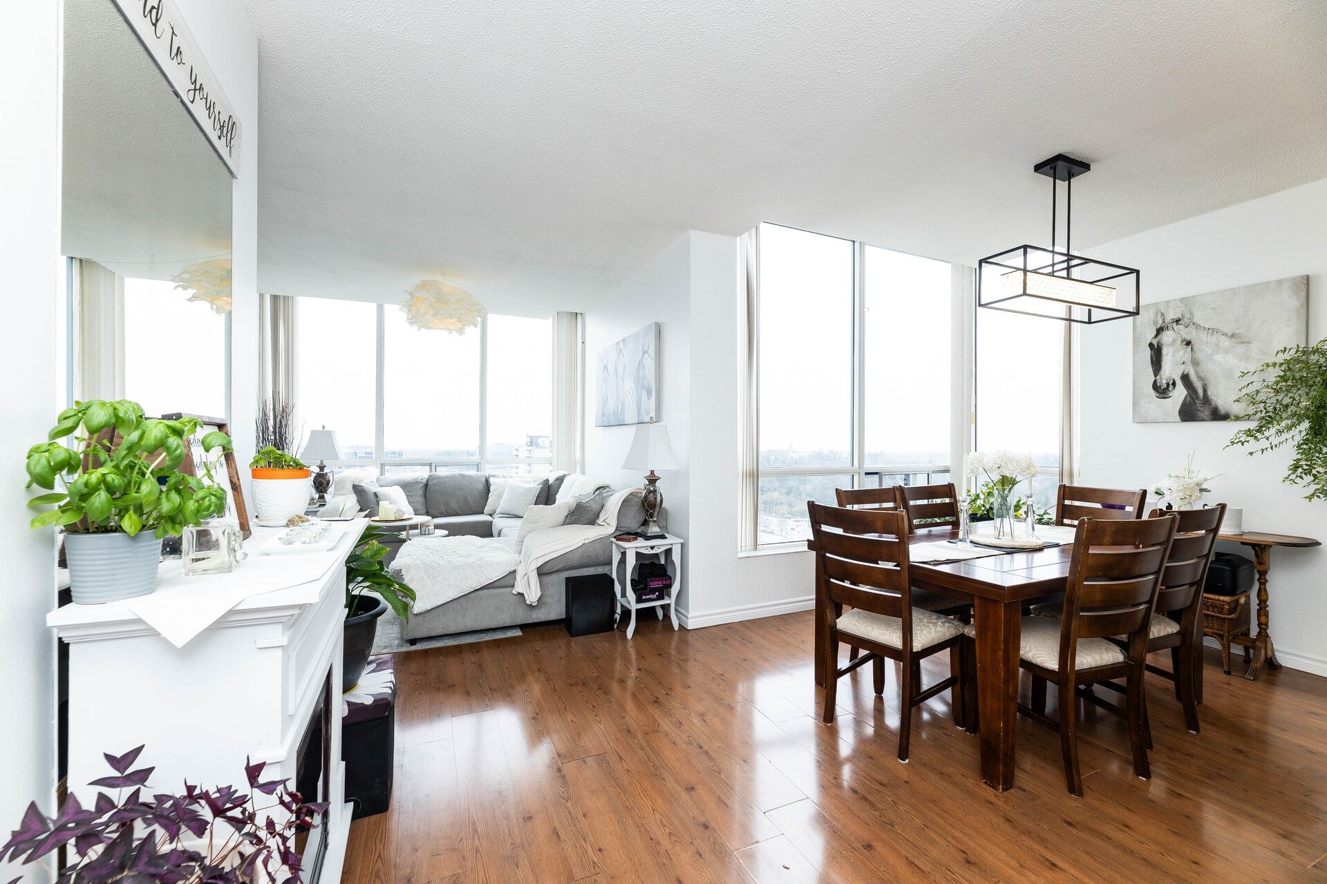 Luxurious living and dining area of penthouse apartment, 3050 Ellesmere